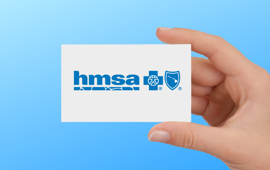 Hand holding HMSA card