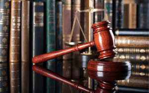 Gavel with books in the background